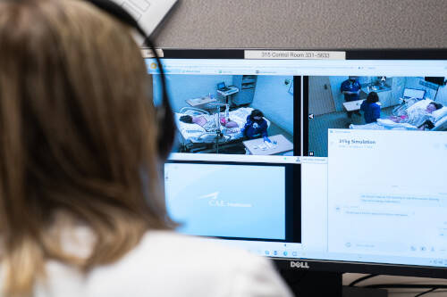Nursing faculty observing students